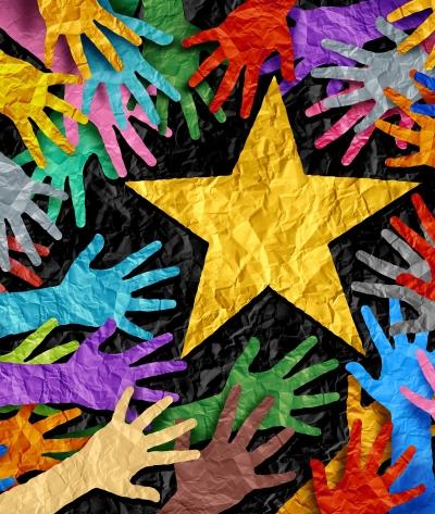star surrounded by supportive hands